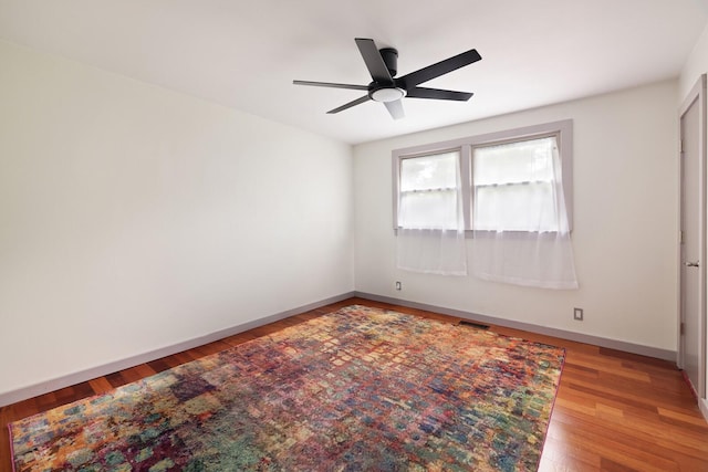 5904 S New Hope Rd, Hermitage, TN 37076 - empty room with a ceiling fan, light wood-style flooring, and baseboards