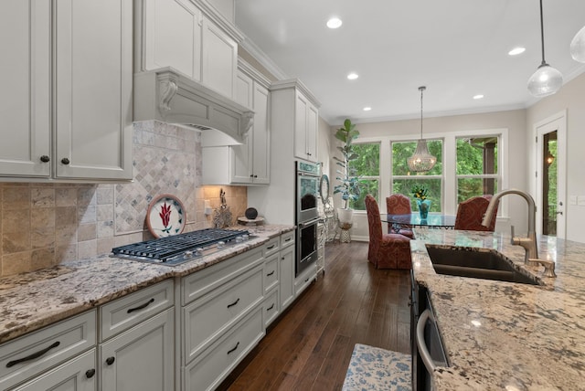 410 Pastoral Way, Nolensville, TN 37135 - kitchen with a sink, healthy amount of natural light, stainless steel appliances, decorative backsplash, and recessed lighting