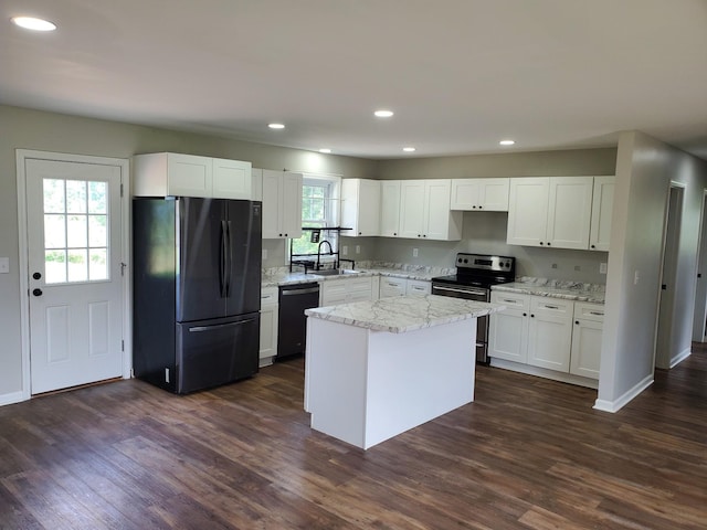 910 Hassell Dr, Waynesboro, TN 38485 - kitchen with black appliances, a sink, dark wood-style flooring, white cabinetry, and recessed lighting