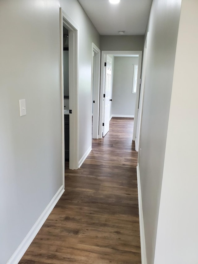 910 Hassell Dr, Waynesboro, TN 38485 - hall with baseboards and dark wood-style flooring