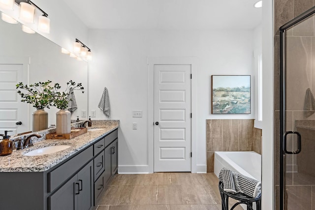 1105 Sunnymeade Dr, Nashville, TN 37216 - full bath featuring double vanity, a garden tub, a stall shower, and baseboards