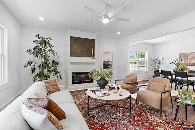 1105 Sunnymeade Dr, Nashville, TN 37216 - living room with baseboards, a glass covered fireplace, a ceiling fan, recessed lighting, and wood finished floors