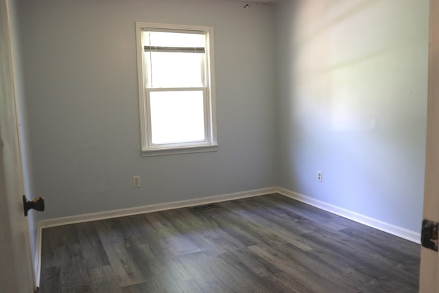 90 Laurel Ln, Paris, TN 38242 - spare room with dark wood-style floors and baseboards