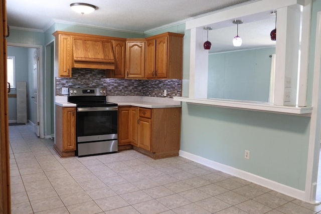 90 Laurel Ln, Paris, TN 38242 - kitchen featuring stainless steel range with electric stovetop, ornamental molding, light countertops, decorative backsplash, and brown cabinetry