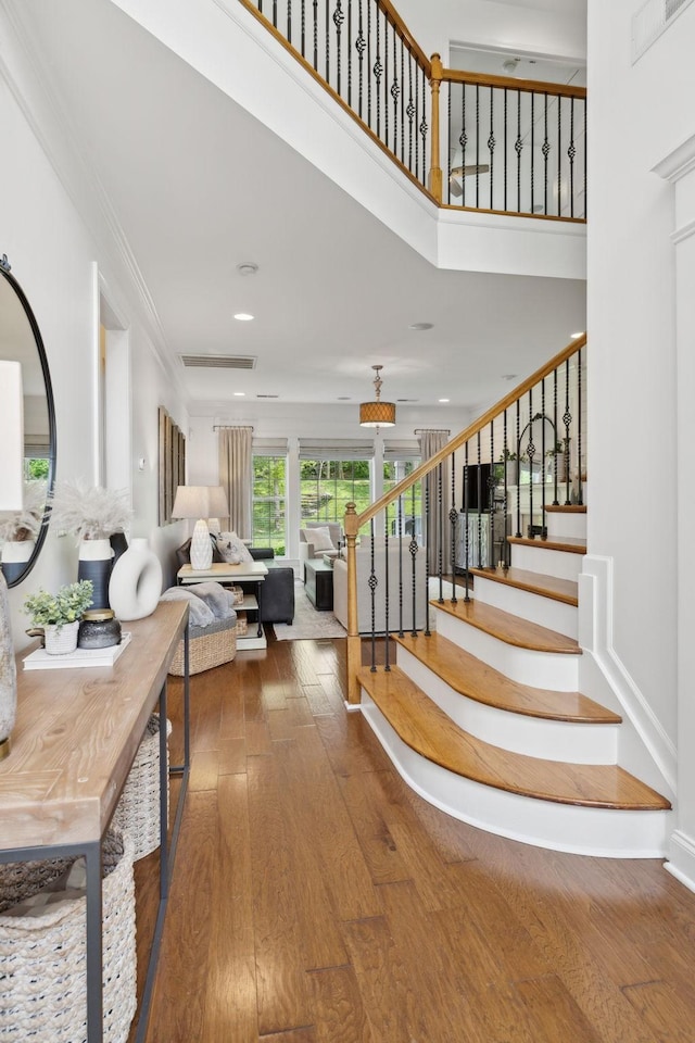 1018 Buddleia Ln, Franklin, TN 37067 - stairs with hardwood / wood-style flooring and recessed lighting