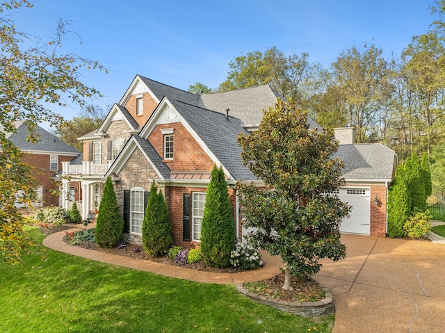 1018 Buddleia Ln, Franklin, TN 37067 - view of front of home featuring concrete driveway, an attached garage, a standing seam roof, a shingled roof, and brick siding