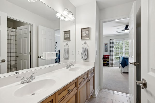 1018 Buddleia Ln, Franklin, TN 37067 - bathroom featuring double vanity, tile patterned floors, a ceiling fan, connected bathroom, and baseboards