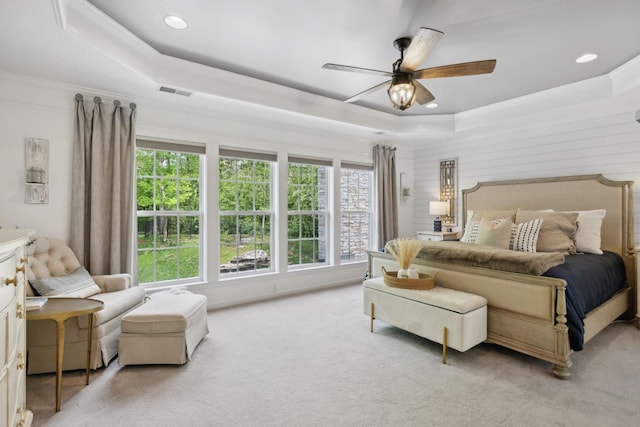 1018 Buddleia Ln, Franklin, TN 37067 - bedroom featuring a tray ceiling, multiple windows, light carpet, ornamental molding, and recessed lighting