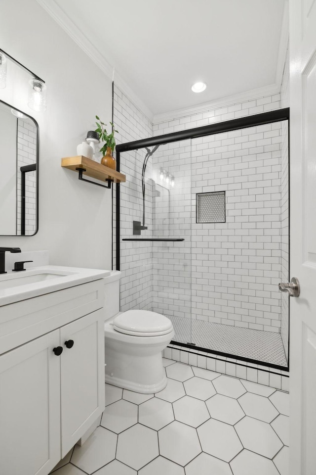 1018 Buddleia Ln, Franklin, TN 37067 - full bath featuring crown molding, a stall shower, vanity, toilet, and recessed lighting
