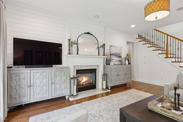 1018 Buddleia Ln, Franklin, TN 37067 - living room with wood finished floors, a fireplace, stairs, and recessed lighting