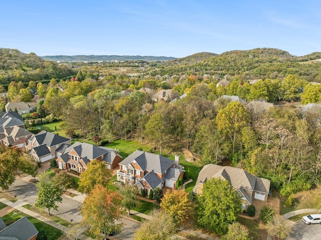 1018 Buddleia Ln, Franklin, TN 37067 - aerial view of residential area with a forest and a mountain backdrop