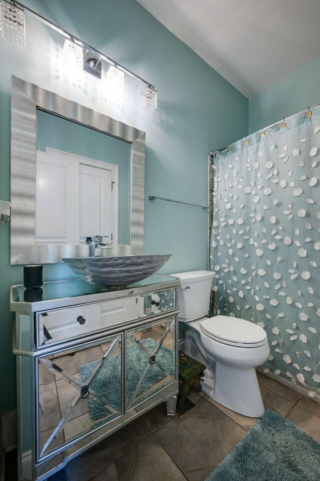 2290 Osburn Rd, Arrington, TN 37014 - bathroom with toilet, tile patterned floors, vanity, and curtained shower