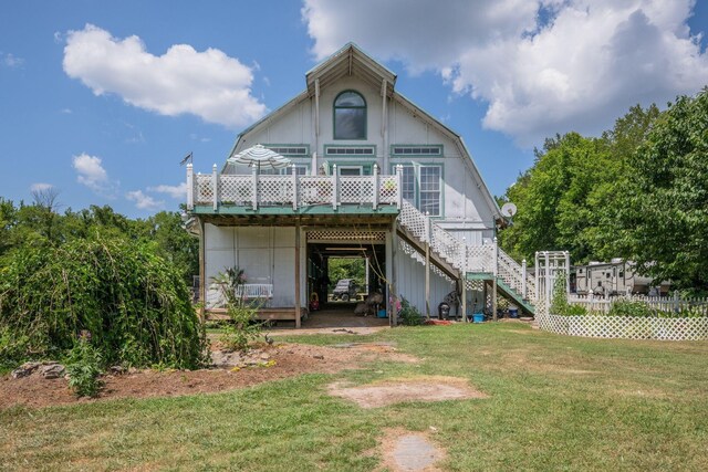 2290 Osburn Rd, Arrington, TN 37014 - rear view of house featuring stairs, a yard, a gambrel roof, and a deck