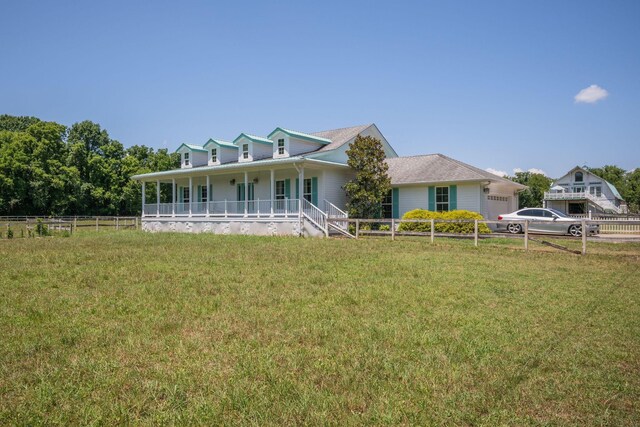 2290 Osburn Rd, Arrington, TN 37014 - farmhouse-style home featuring a porch and a garage