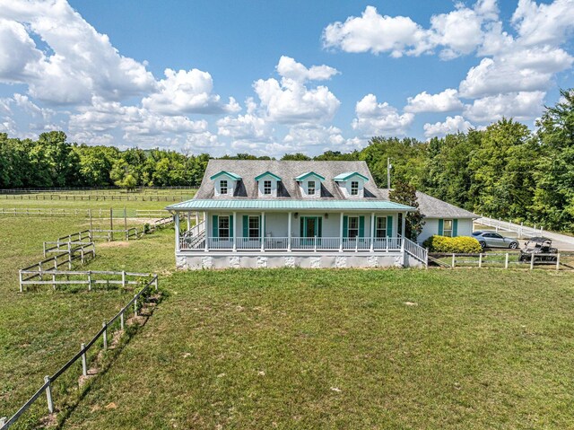 2290 Osburn Rd, Arrington, TN 37014 - country-style home featuring a porch and a forest view