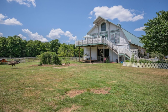 2290 Osburn Rd, Arrington, TN 37014 - rear view of property featuring stairway, a wooden deck, and board and batten siding
