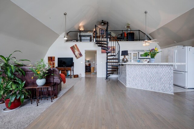 2290 Osburn Rd, Arrington, TN 37014 - living room with a ceiling fan, wood finished floors, stairway, and high vaulted ceiling