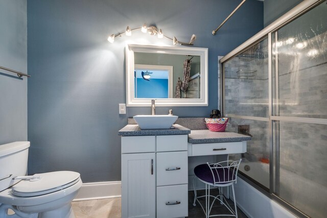 2290 Osburn Rd, Arrington, TN 37014 - full bath featuring shower / bath combination with glass door, vanity, toilet, and baseboards