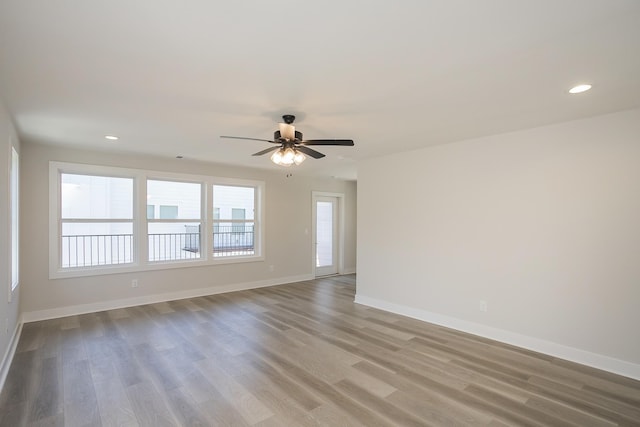 1137 Lawrence Ave Unit 1, Madison, TN 37115 - unfurnished room featuring baseboards, wood finished floors, a ceiling fan, and recessed lighting