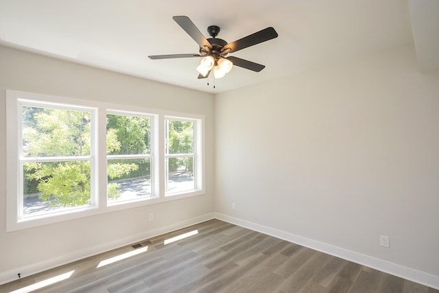 1137 Lawrence Ave Unit 1, Madison, TN 37115 - unfurnished room featuring plenty of natural light, baseboards, and wood finished floors