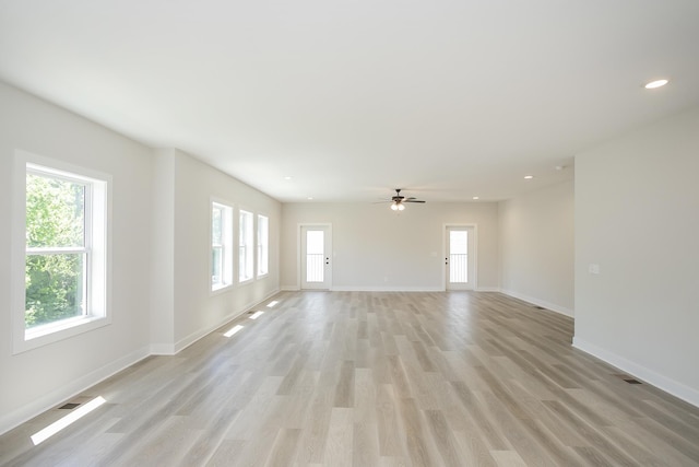 1137 Lawrence Ave Unit 1, Madison, TN 37115 - unfurnished living room with baseboards, light wood-style floors, ceiling fan, and recessed lighting