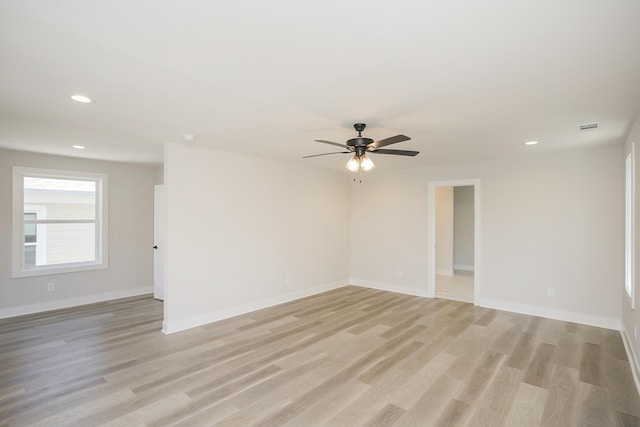 1137 Lawrence Ave Unit 1, Madison, TN 37115 - empty room featuring light wood-style flooring, ceiling fan, recessed lighting, and baseboards