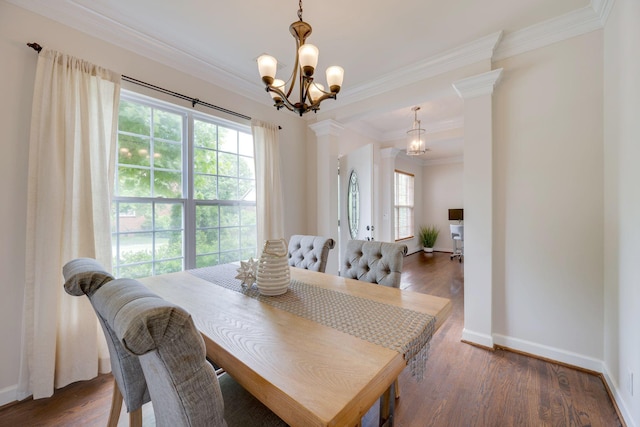 1201 Limerick Ln, Franklin, TN 37067 - dining area with a chandelier, crown molding, baseboards, and wood finished floors