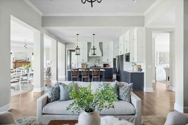 4136 Banner Square Ln, Arrington, TN 37014 - living room featuring dark wood-style floors, a chandelier, baseboards, crown molding, and recessed lighting