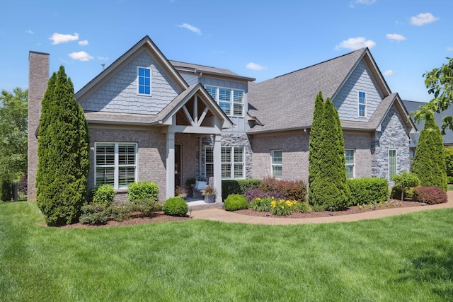 4136 Banner Square Ln, Arrington, TN 37014 - craftsman inspired home featuring a front lawn and brick siding