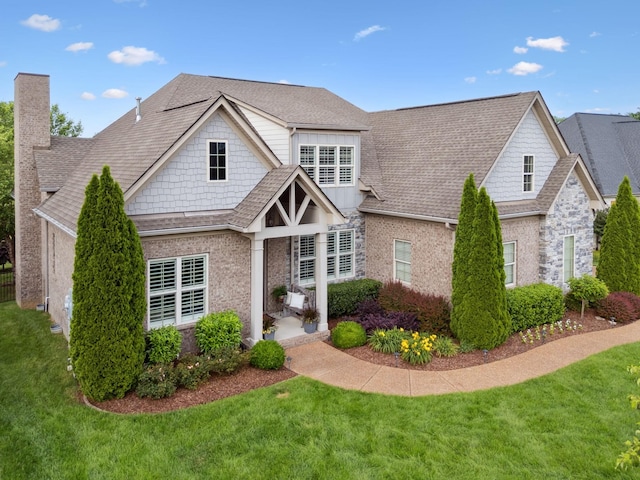 4136 Banner Square Ln, Arrington, TN 37014 - view of front of home featuring a front lawn, a chimney, and roof with shingles