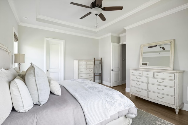 4136 Banner Square Ln, Arrington, TN 37014 - bedroom featuring a raised ceiling, dark wood-style flooring, crown molding, baseboards, and a ceiling fan