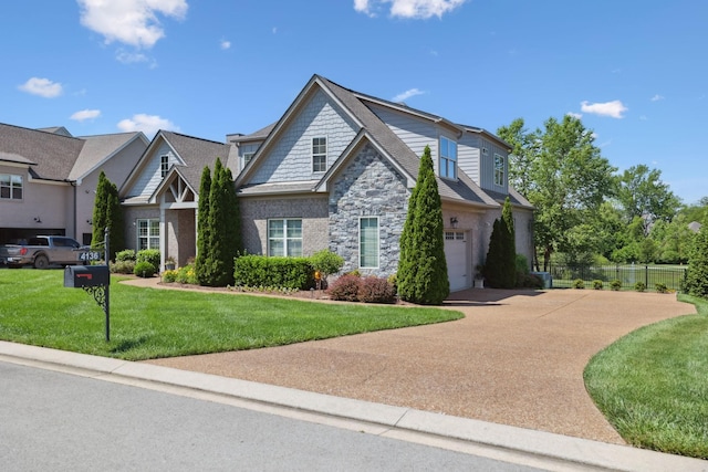 4136 Banner Square Ln, Arrington, TN 37014 - view of front of house with stone siding, concrete driveway, and an attached garage