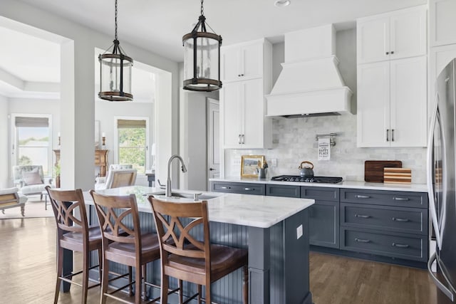 4136 Banner Square Ln, Arrington, TN 37014 - kitchen with premium range hood, white cabinets, a sink, dark wood finished floors, and recessed lighting