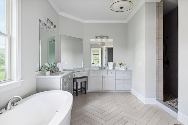 4136 Banner Square Ln, Arrington, TN 37014 - bathroom with a freestanding tub, crown molding, vanity, tiled shower, and baseboards