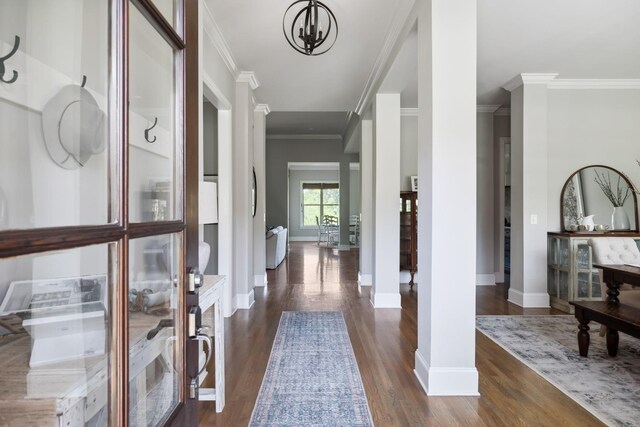 4136 Banner Square Ln, Arrington, TN 37014 - hallway featuring crown molding, dark wood-type flooring, baseboards, and a chandelier