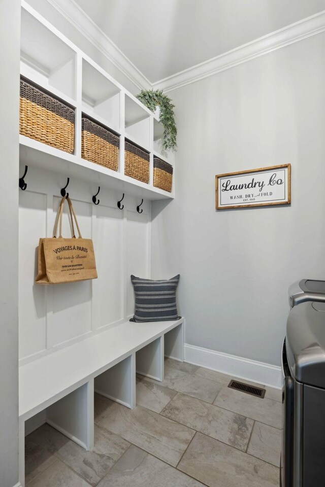 4136 Banner Square Ln, Arrington, TN 37014 - mudroom with ornamental molding, independent washer and dryer, and baseboards