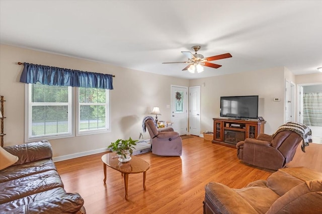 4190 Tanyard Hill Rd, Lynchburg, TN 37352 - living area with light wood-style floors, ceiling fan, and baseboards