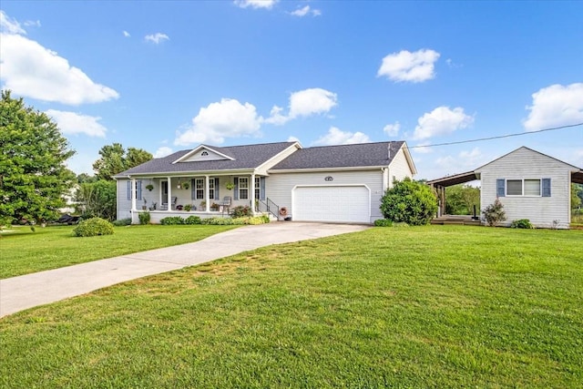 4190 Tanyard Hill Rd, Lynchburg, TN 37352 - ranch-style house featuring covered porch, a garage, driveway, and a front lawn