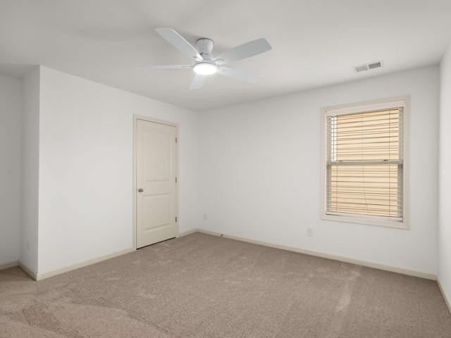3029 Alan Dr, Spring Hill, TN 37174 - unfurnished room featuring light carpet, ceiling fan, and baseboards