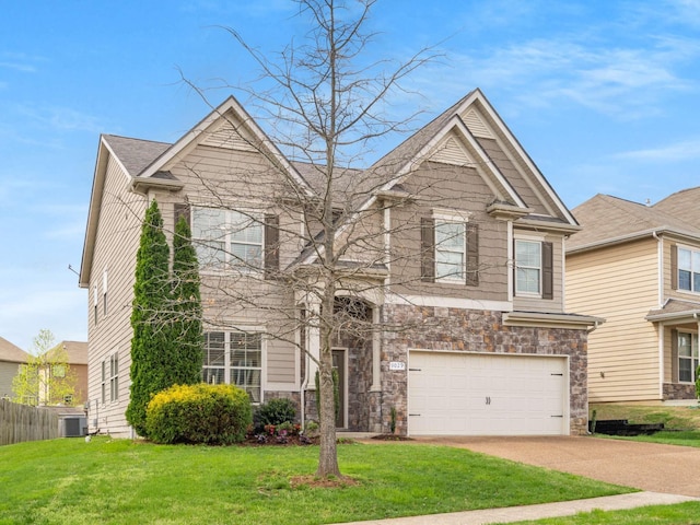 3029 Alan Dr, Spring Hill, TN 37174 - view of front of house with stone siding, a garage, and concrete driveway
