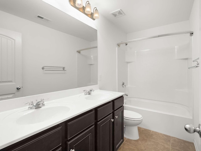 3029 Alan Dr, Spring Hill, TN 37174 - bathroom featuring toilet, double vanity, shower / bathtub combination, and tile patterned flooring