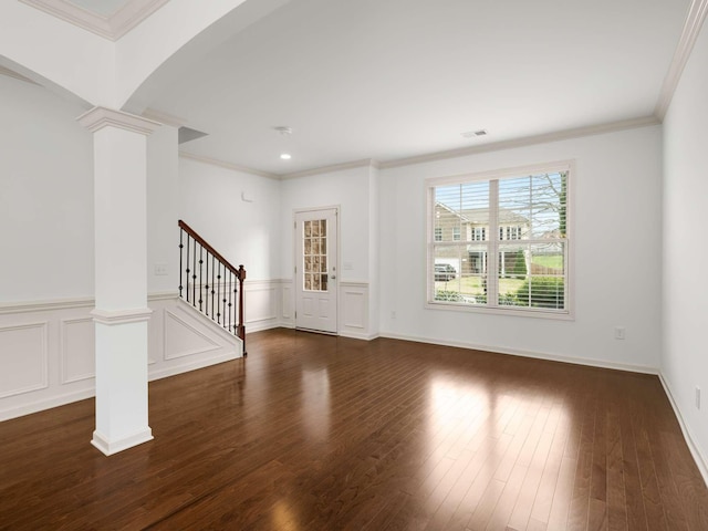 3029 Alan Dr, Spring Hill, TN 37174 - foyer entrance featuring decorative columns, stairs, wood finished floors, and ornamental molding