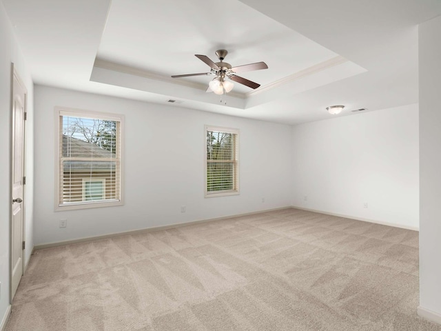 3029 Alan Dr, Spring Hill, TN 37174 - unfurnished room featuring a raised ceiling, light carpet, a ceiling fan, ornamental molding, and baseboards