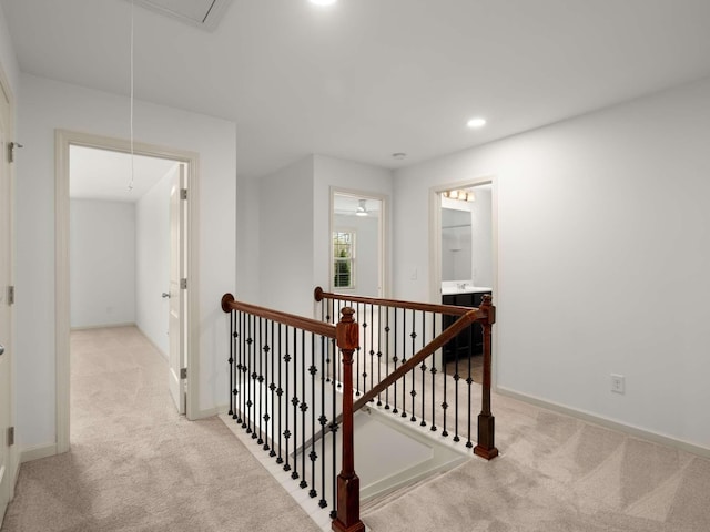 3029 Alan Dr, Spring Hill, TN 37174 - corridor featuring attic access, an upstairs landing, carpet flooring, baseboards, and recessed lighting