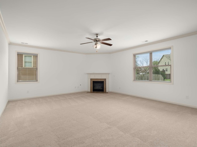 3029 Alan Dr, Spring Hill, TN 37174 - unfurnished living room featuring ornamental molding, light colored carpet, ceiling fan, a fireplace with flush hearth, and baseboards