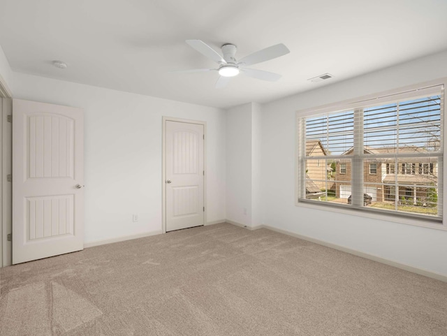 3029 Alan Dr, Spring Hill, TN 37174 - spare room with light colored carpet, a ceiling fan, baseboards, and a smoke detector