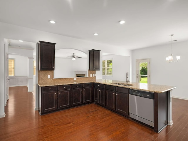3029 Alan Dr, Spring Hill, TN 37174 - kitchen featuring dishwasher, a sink, dark wood-style floors, a ceiling fan, and dark brown cabinets