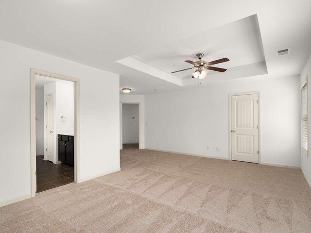 3029 Alan Dr, Spring Hill, TN 37174 - unfurnished room with a raised ceiling, carpet flooring, a ceiling fan, and baseboards
