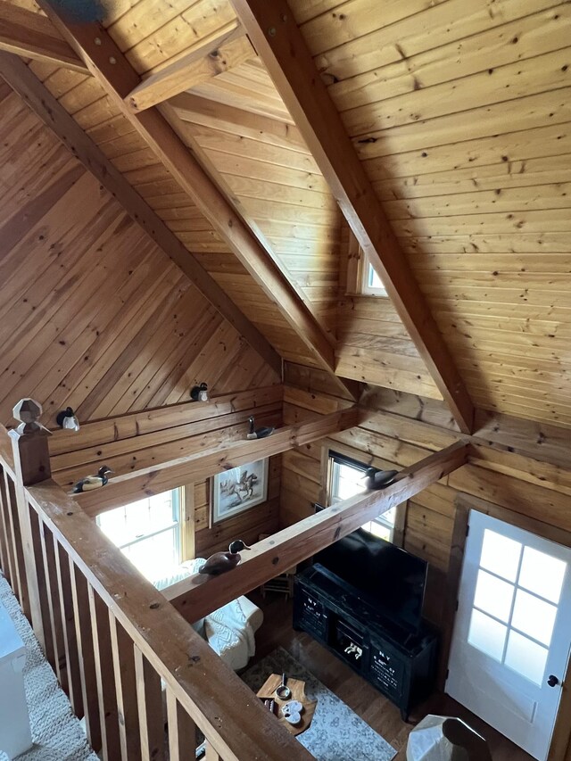 225 Bill Hunter Rd, Celina, TN 38551 - hall with wood ceiling with exposed beams, wood walls, plenty of natural light, and wood finished floors