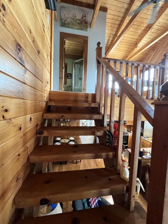 225 Bill Hunter Rd, Celina, TN 38551 - stairway featuring wood walls and wood ceiling with exposed beams